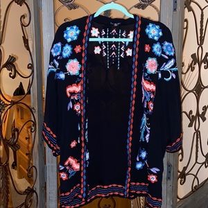 Size Medium/large kimono. Black with design
